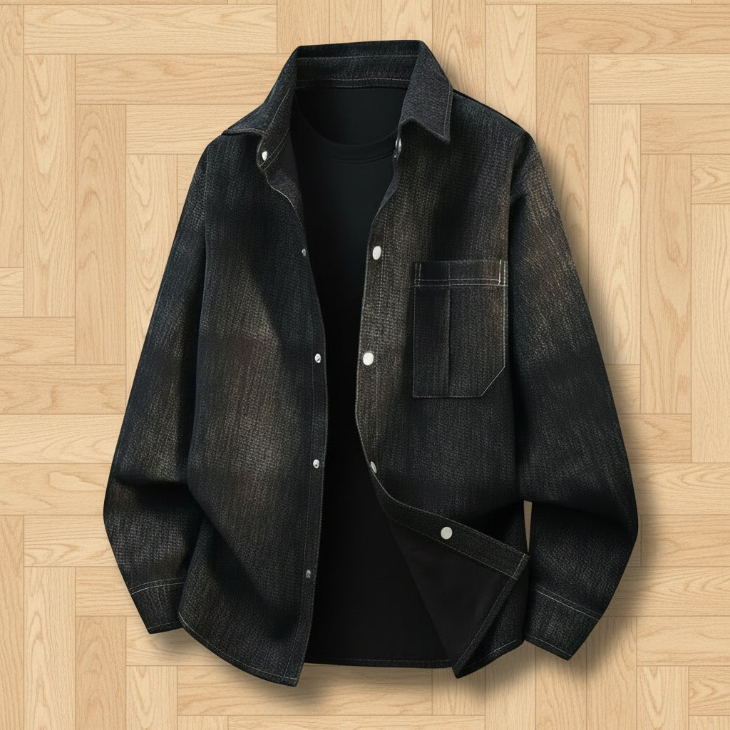 Black denim shirt on a wooden floor